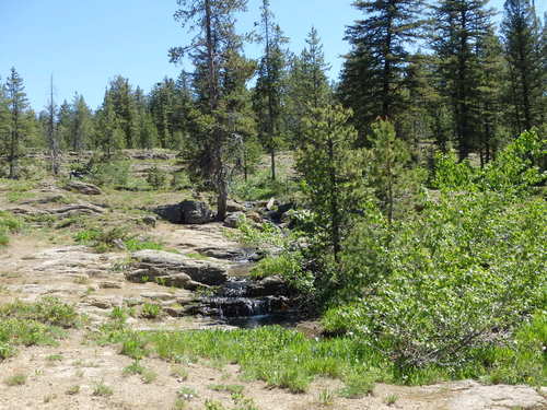 GDMBR: A little waterfall and rock park looks like a great place to wild camp.